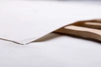 bavlněná kuchařská zástěra béžová s potiskem loga - foto 6