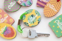 přívěšek na klíče na zakázku zelená s potiskem loga - foto 3