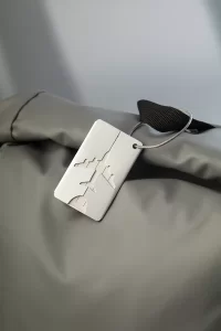 visačka na zavazadla stříbrná s potiskem loga - foto 7